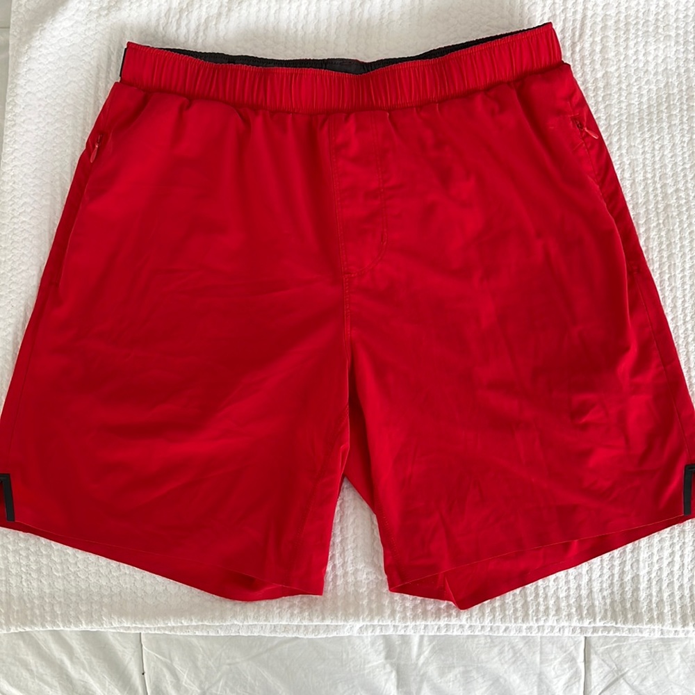 New Rhône Men’s Peloton red lined shorts